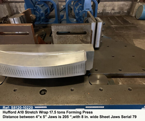 Hufford A-10 Stretch Wrap Forming Press Distance between 4" x 5" jaws 205" - 17.5 tons - Tension Cylinder Stroke18½", Simultaneous Arms Movement, Serial Number 79, Inventory reference S8120-10220-5 Close-up Work-area with Sheet Jaws