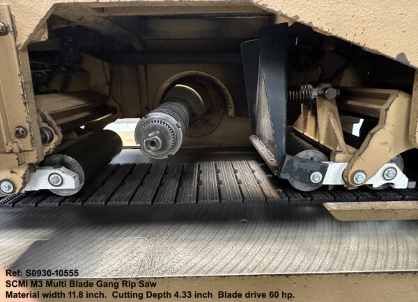 SCMI M3 Multi Blade Gang Rip Saw, Width 11.8 inch Depth 4.33 inch, Minimu board length 18 inch, Blade drive 60 hp Sn AB10683., Close-up Saw Arbor - Inffeed & Outfeed Rollers. Ref 10555-3